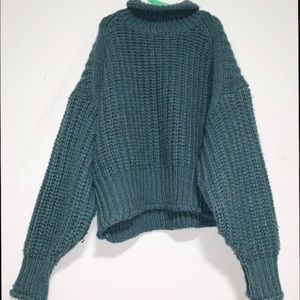 Oversized turtleneck knit sweater